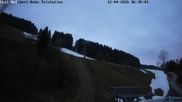 Archiviertes Webcam Bild: Ofterschwang: Talstation Ossi-Reichert-Bahn am 12.04.2026 um 06:24 Uhr
