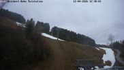 Archiviertes Webcam Bild: Ofterschwang: Talstation Ossi-Reichert-Bahn am 12.04.2026 um 12:24 Uhr