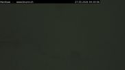 Archived webcam image showing Engelberg: Lake Härzlisee & mountain restaurant Kräuterhütte on 27 Mar 2026 at 04:00