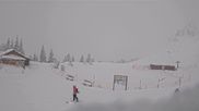 Archived webcam image showing Engelberg: Lake Härzlisee & mountain restaurant Kräuterhütte on 27 Mar 2026 at 10:00