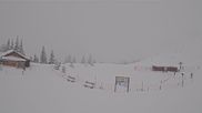 Archived webcam image showing Engelberg: Lake Härzlisee & mountain restaurant Kräuterhütte on 27 Mar 2026 at 14:00