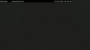 Archived webcam image showing Engelberg: Lake Härzlisee & mountain restaurant Kräuterhütte on 12 May 2026 at 04:53