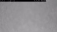 Archived webcam image showing Engelberg: Lake Härzlisee & mountain restaurant Kräuterhütte on 12 May 2026 at 10:53