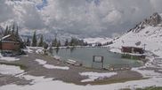 Archived webcam image showing Engelberg: Lake Härzlisee & mountain restaurant Kräuterhütte on 12 May 2026 at 16:53