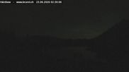 Archived webcam image showing Engelberg: Lake Härzlisee & mountain restaurant Kräuterhütte on 23 Jun 2026 at 02:32