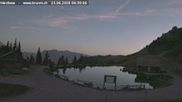 Archived webcam image showing Engelberg: Lake Härzlisee & mountain restaurant Kräuterhütte on 23 Jun 2026 at 04:32