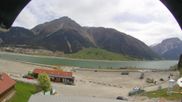 Archiviertes Webcam Bild: Schöneben: Talstation der Bergbahn mit Blick auf Reschensee und Dorf Reschen am 04.05.2026 um 12:27 Uhr