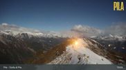 Archived webcam image showing Pila Snowland - Couis 1 on 25 Oct 2026 at 19:10