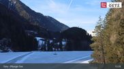 Archived webcam image showing Oetztal: View Lake Piburg on 26 Feb 2026 at 13:17