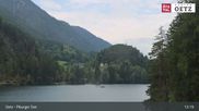 Archived webcam image showing Oetztal: View Lake Piburg on 6 Aug 2026 at 13:04
