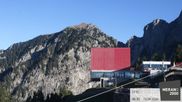 Archived webcam image showing mountain station gondola on 15 Sep 2026 at 08:59