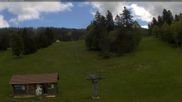 Archived webcam image showing Les Bugnenets Savagnieres valley station on 16 May 2026 at 14:24