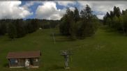 Archived webcam image showing Les Bugnenets Savagnieres valley station on 16 May 2026 at 18:24