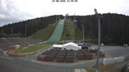 Archived webcam image showing Ski Jumping Venue at Vogtland Arena on 25 Aug 2026 at 14:14