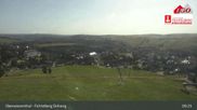 Archived webcam image showing Oberwiesenthal - Fichtelberg ski slope on 10 Aug 2026 at 09:41