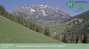 Archived webcam image showing Grünegg Alm in Dienten on 1 May 2026 at 12:44