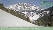 Archived webcam image showing Grünegg Alm in Dienten on 26 Feb 2026 at 12:28