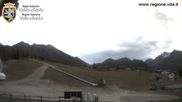 Archived webcam image showing Brusson - View over the slope on 19 Oct 2026 at 08:19