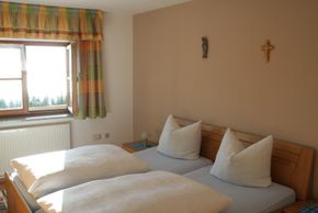 ein Schlafzimmer des Ferienhauses