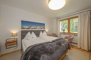 Schlafzimmer einer Ferienwohnung