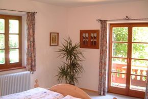 Schlafzimmer mit Balkon