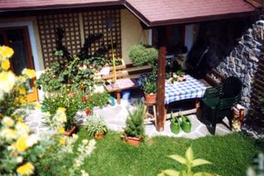 Ferienhaus mit Garten. Zugang von der Ersgeschosswohnung.