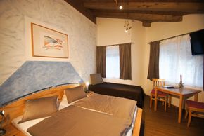 Doppelzimmer mit Zusatzbett