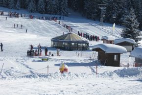 Schirmbar und Schischule gleich nebenan