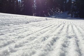 Artificial snow is used at the base so the runs are also perfectly groomed.
