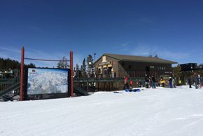 The sun deck at The Outpost at the base station of Chair 13.