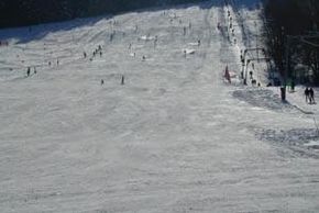 Well-groomed slopes are waiting for skiers.