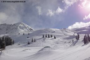 View of Treeline Terrain Park for snowboarders.