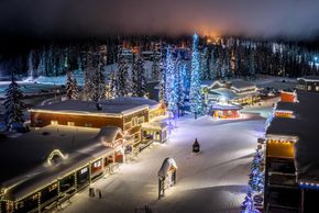 Silver Star Mountain Resort Village lit up at night.