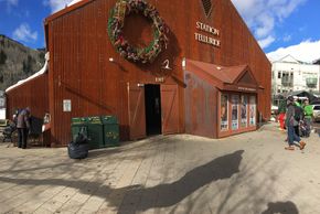 Spot the Oak Street Lift behind Telluride Station and its Visitor Information Center.