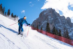 skiing on the famous Saslong slope in Val Gardena