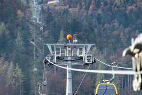 Travel up to the Zwölferhorn in 8-seater gondolas.