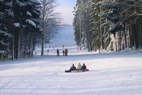 Snowboarder bei einer kleinen Pause