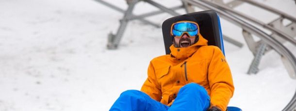 The 4,800-foot-long alpine mountain coaster Beast Mountain Coaster twists and turns through the woods.