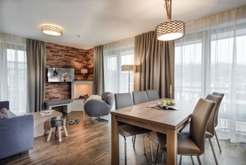 Die modernen Apartments sind in alpinem Stil eingerichtet.
