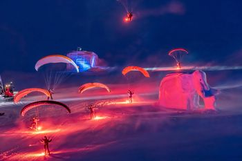 A breathtaking display of color under the open night sky awaits visitors.