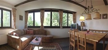 Wohnzimmer - Ferienwohnung MURMELBAU