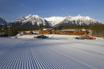 Enjoy the breathtaking scenery behind the Lake Louise base station.