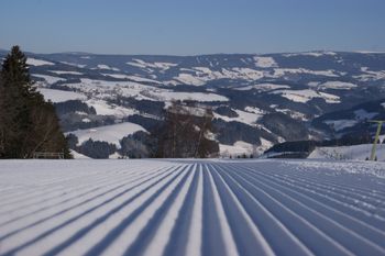 Piste und Winterlandschaft Almblicklifte