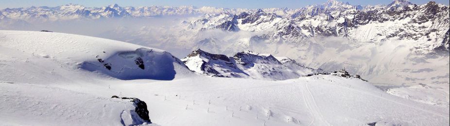 View from Klein Matterhorn over the t-bars on Theodul glacier and the border to Italy on Testa Grigia.